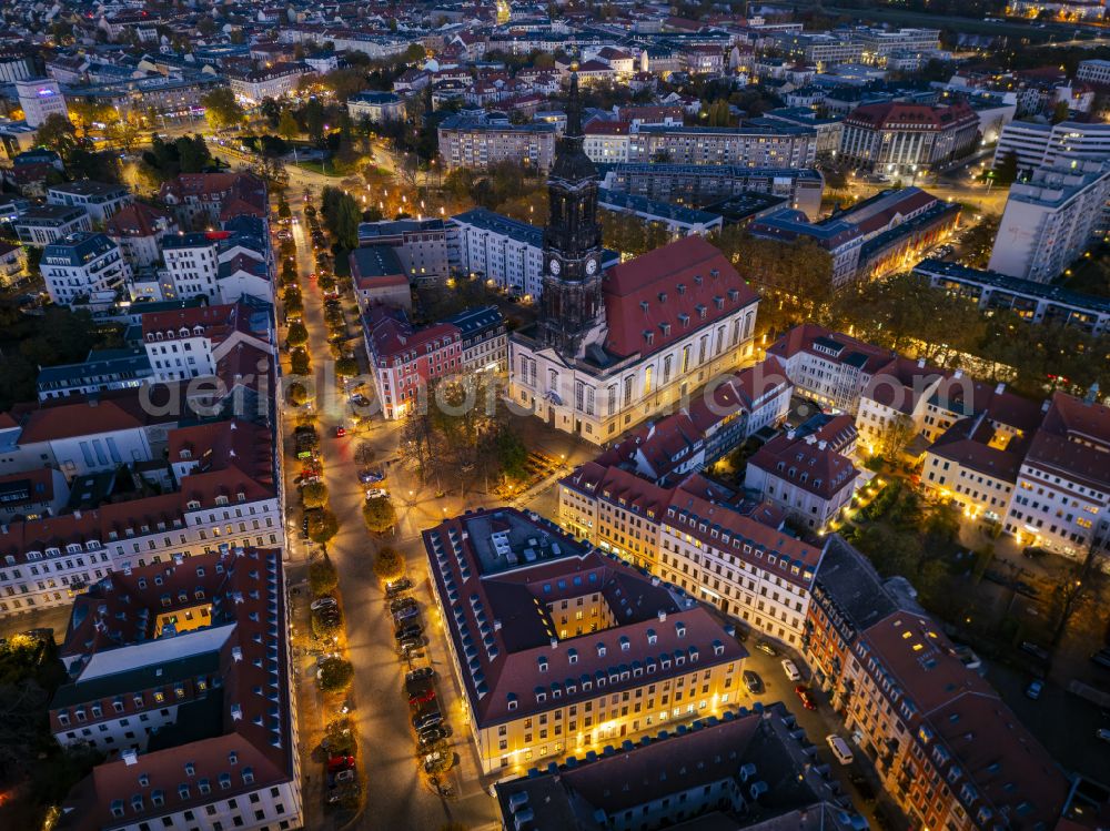 Aerial image at night Dresden - Night lighting church building Dreikoenigskirche on Koenigstrasse - Metzer Strasse in the district Innere Neustadt in Dresden in the state Saxony, Germany