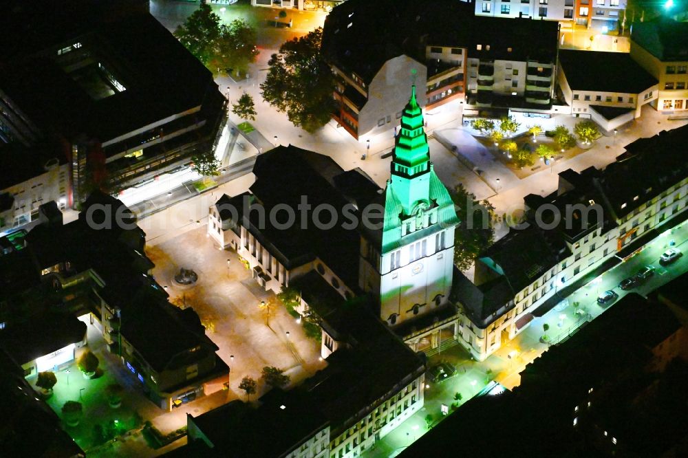 Aerial image at night Völklingen - Night lighting church building in St. Eligius on Old Town- center of downtown in Voelklingen in the state Saarland, Germany