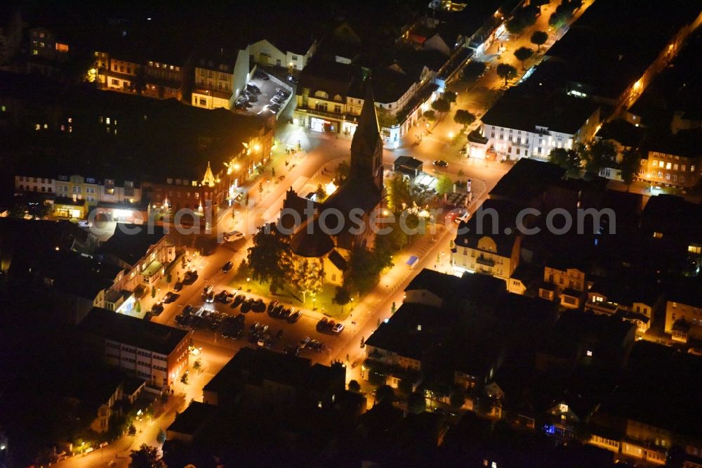 Rostock at night from above - Night lighting Church building Evangelisch-Lutherische Kirchgemeinde Warnemuende on Kirchenplatz in the district Warnemuende in Rostock in the state Mecklenburg - Western Pomerania, Germany