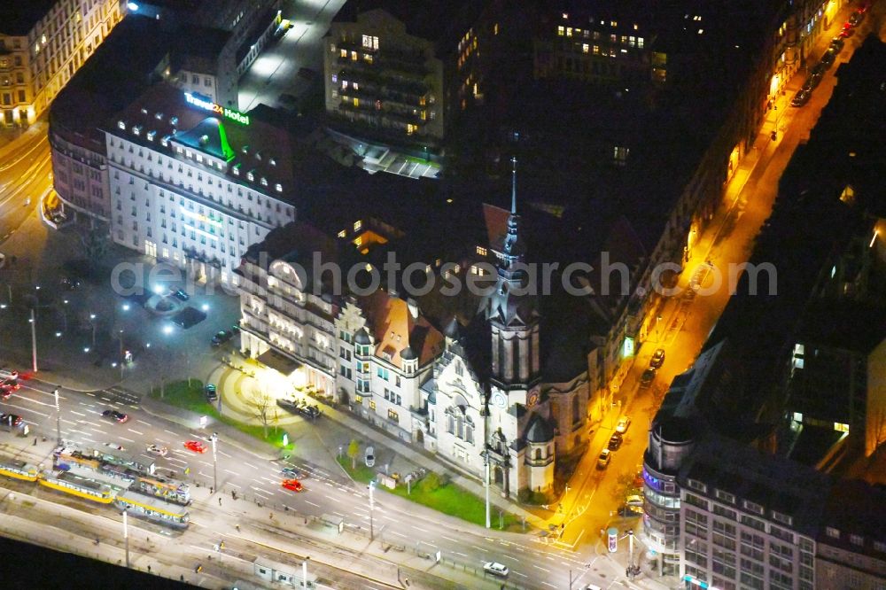 Leipzig at night from above - Night lighting Church building in Evangelisch Reformierte Kirche zu Leipzig on Troendlinring Old Town- center of downtown in the district Mitte in Leipzig in the state Saxony, Germany