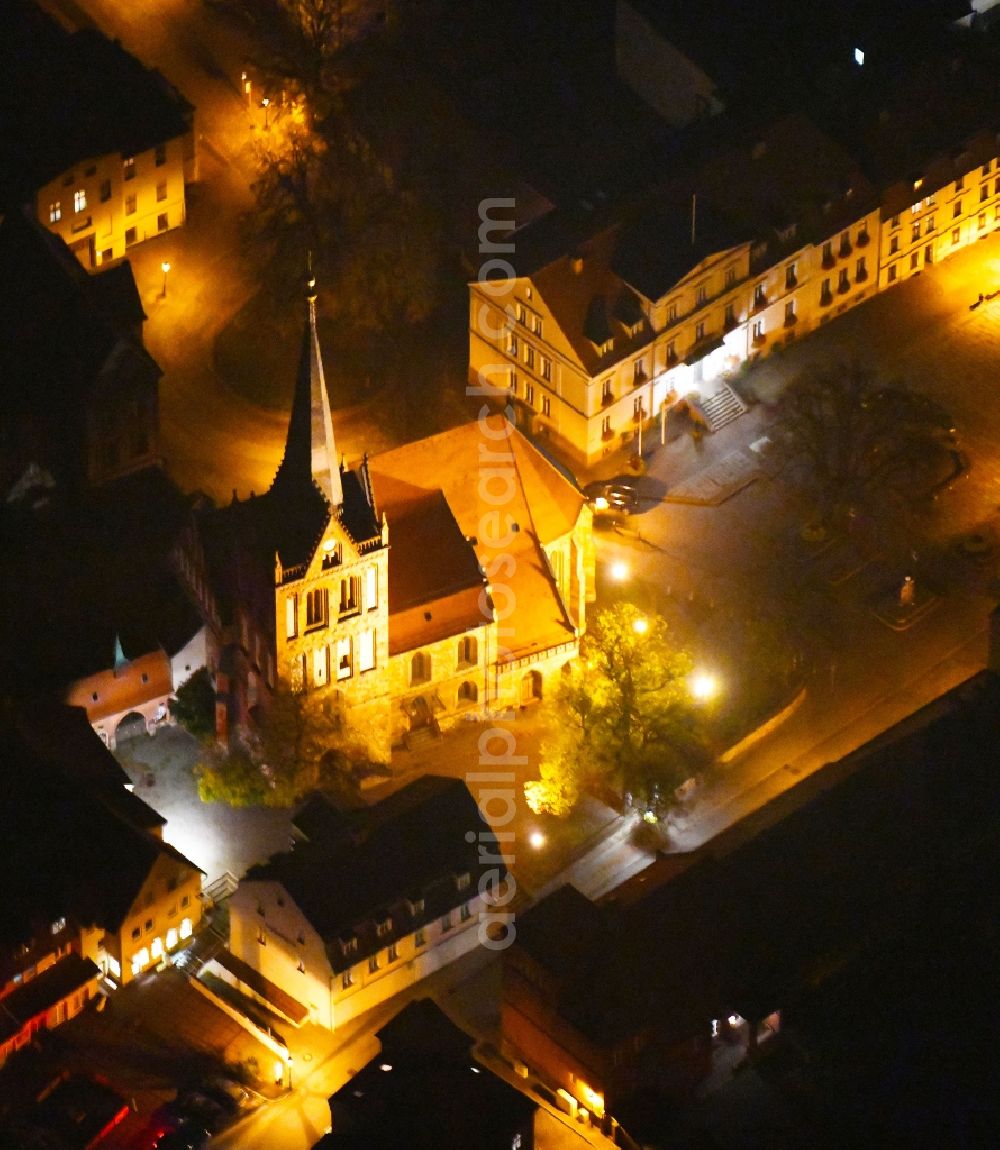 Aerial image at night Bad Freienwalde (Oder) - Night lighting Church building Evangelische Stadtpfarrkirche St. Nikolai in Bad Freienwalde (Oder) in the state Brandenburg, Germany