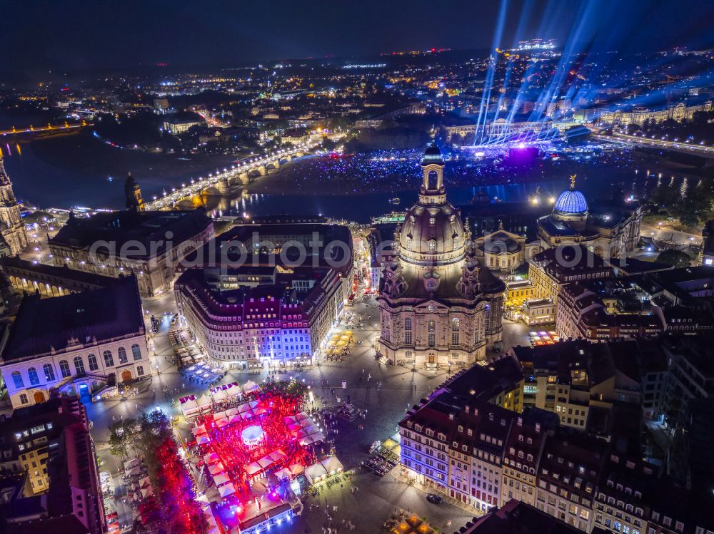 Aerial image at night Dresden - Night lights and illumination of the church building Frauenkirche Dresden on the Neumarkt in the Altstadt district of Dresden in the state of Saxony, Germany