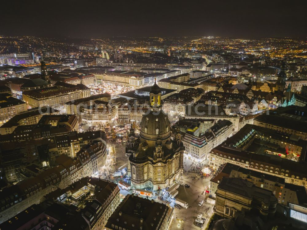 Dresden at night from the bird perspective: Night lighting night lights and illumination of the church building Frauenkirche Dresden on the Neumarkt in the Altstadt district of Dresden in the state of Saxony, Germany