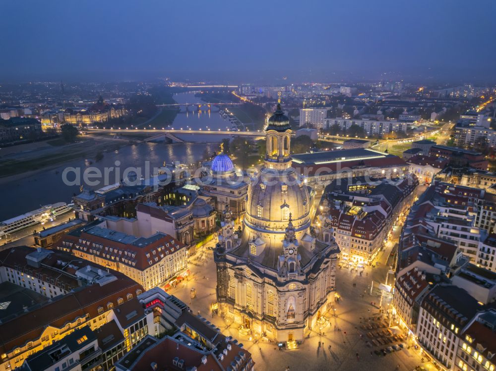 Dresden at night from the bird perspective: Night lighting night lights and illumination of the church building Frauenkirche Dresden on the Neumarkt in the Altstadt district of Dresden in the state of Saxony, Germany