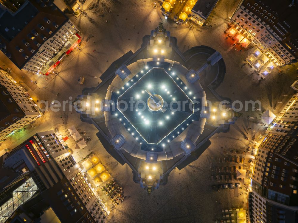 Aerial image at night Dresden - Night lighting night lights and illumination of the church building Frauenkirche Dresden on the Neumarkt in the Altstadt district of Dresden in the state of Saxony, Germany