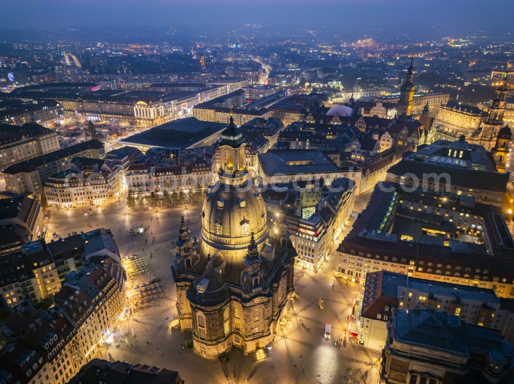 Aerial image at night Dresden - Night lighting night lights and illumination of the church building Frauenkirche Dresden on the Neumarkt in the Altstadt district of Dresden in the state of Saxony, Germany