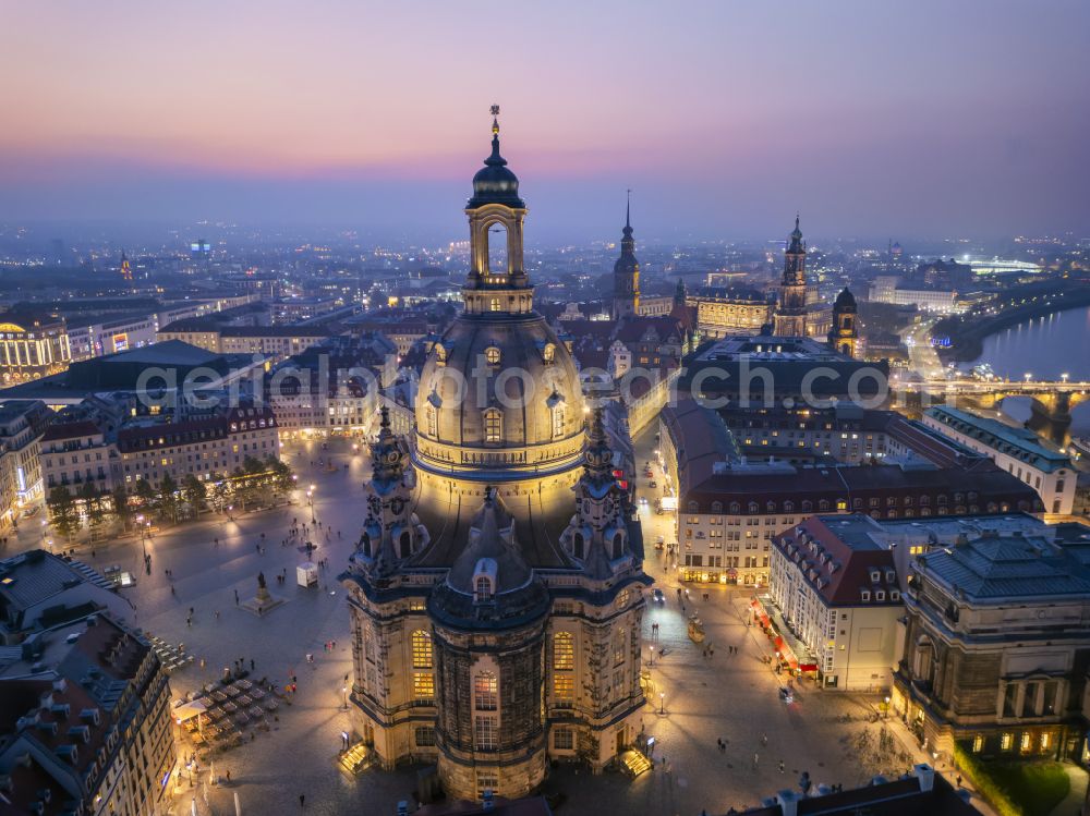 Aerial image at night Dresden - Night lighting night lights and illumination of the church building Frauenkirche Dresden on the Neumarkt in the Altstadt district of Dresden in the state of Saxony, Germany