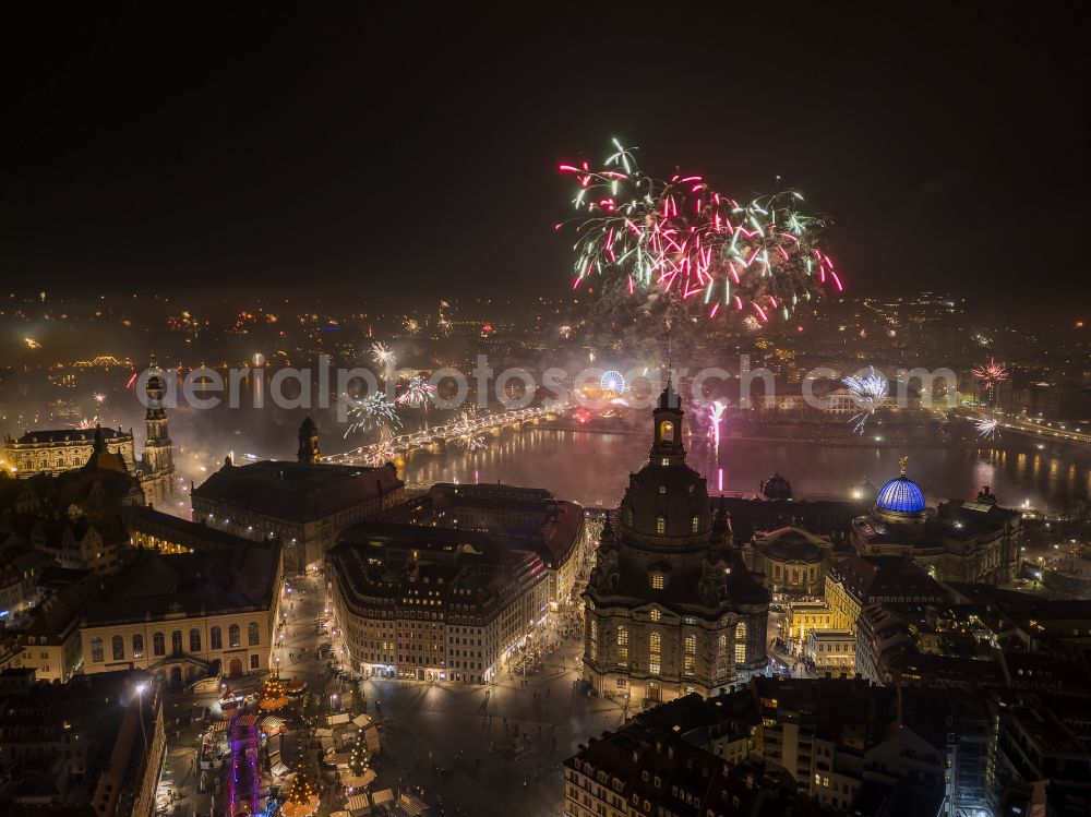 Aerial image at night Dresden - Night lighting Night lights and illumination of the church building Frauenkirche Dresden on the Neumarkt for the New Years Eve fireworks in the Altstadt district of Dresden in the federal state of Saxony, Germany