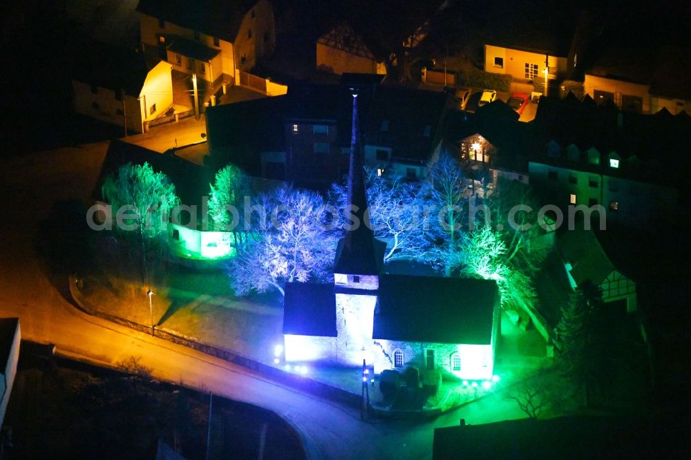 Aerial image at night Gelmeroda - Night lighting Church building in Gelmeroda in the state Thuringia, Germany