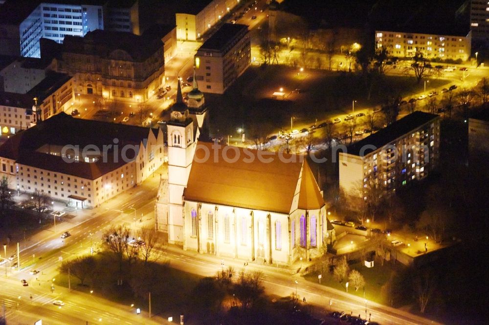 Aerial image at night Magdeburg - Night lighting Church building Johanniskirche on Johannisbergstrasse in the district Altstadt in Magdeburg in the state Saxony-Anhalt