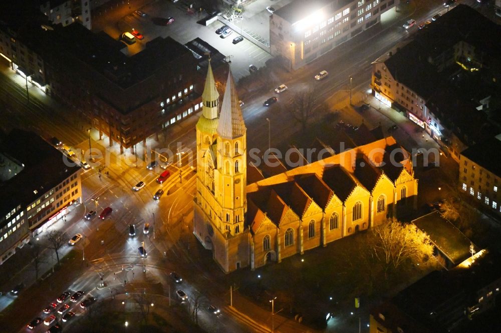 Aerial photograph at night Braunschweig - Night lights and lighting church building the Saint Katharinenkirche in Braunschweig in the federal state Lower Saxony