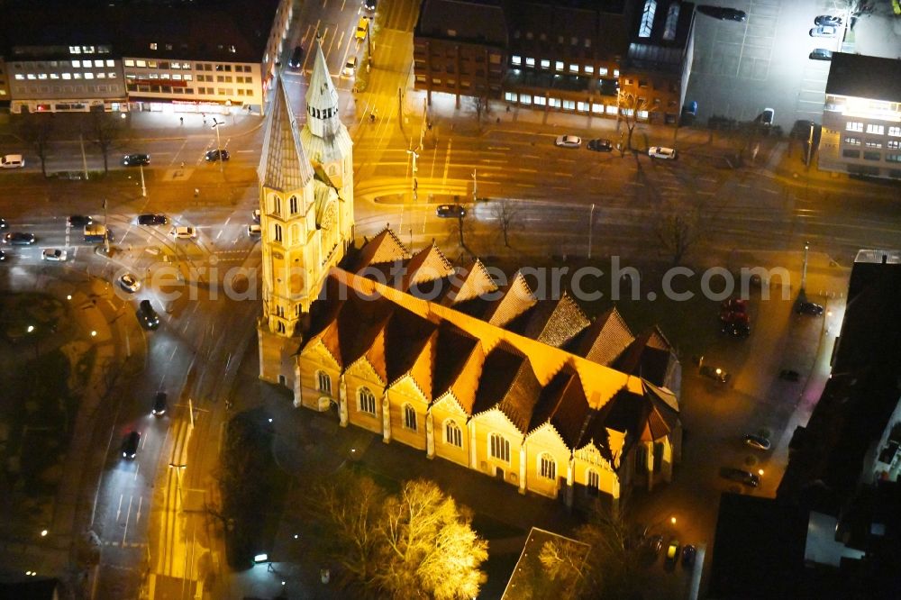 Aerial photograph at night Braunschweig - Night lights and lighting church building the Saint Katharinenkirche in Braunschweig in the federal state Lower Saxony