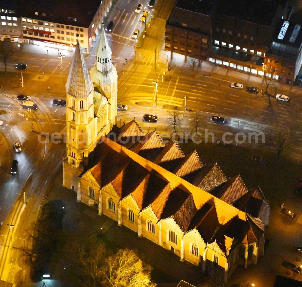 Aerial image at night Braunschweig - Night lights and lighting church building the Saint Katharinenkirche in Braunschweig in the federal state Lower Saxony