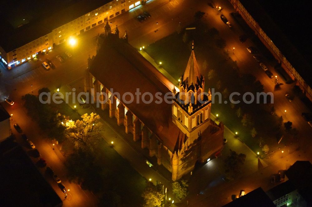 Neubrandenburg at night from above - Night lighting Church building in Konzertkirche - Marienkirche Old Town- center of downtown in Neubrandenburg in the state Mecklenburg - Western Pomerania, Germany