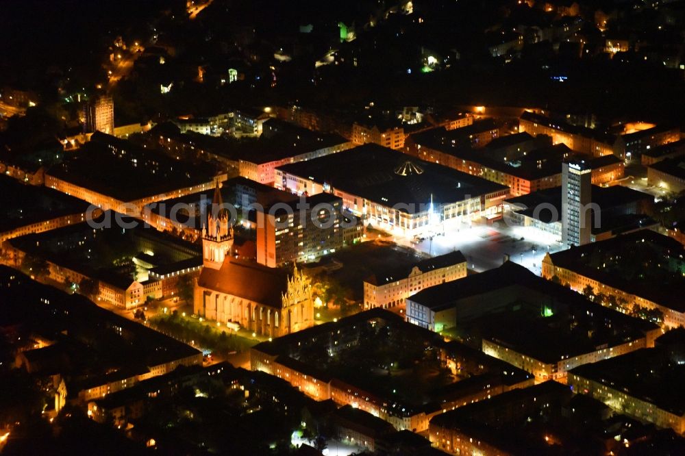 Neubrandenburg at night from above - Night lighting Church building in Konzertkirche - Marienkirche Old Town- center of downtown in Neubrandenburg in the state Mecklenburg - Western Pomerania, Germany