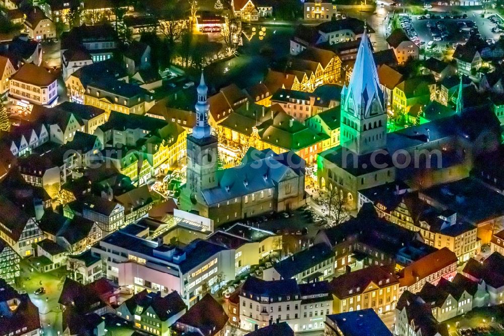 Aerial image at night Soest - Night lighting church building in St. Patrokli- Dom and St. Petri (Alde Kerke) Old Town- center of downtown in Soest in the state North Rhine-Westphalia, Germany