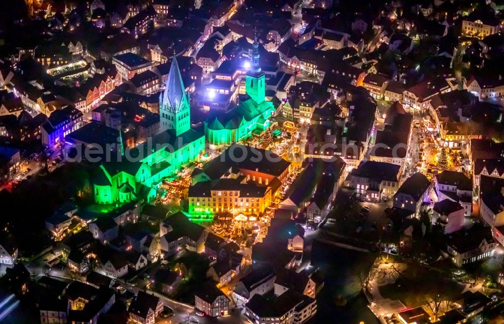 Aerial image at night Soest - Night lighting church building in St. Patrokli- Dom and St. Petri (Alde Kerke) Old Town- center of downtown in Soest in the state North Rhine-Westphalia, Germany