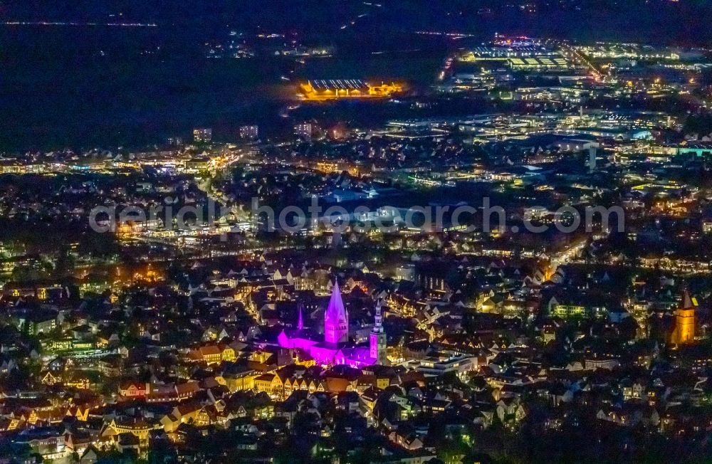 Aerial photograph at night Soest - Night lighting church building in St. Patrokli- Dom and St. Petri (Alde Kerke) Old Town- center of downtown in Soest in the state North Rhine-Westphalia, Germany