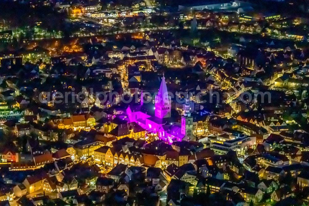 Aerial image at night Soest - Night lighting church building in St. Patrokli- Dom and St. Petri (Alde Kerke) Old Town- center of downtown in Soest in the state North Rhine-Westphalia, Germany