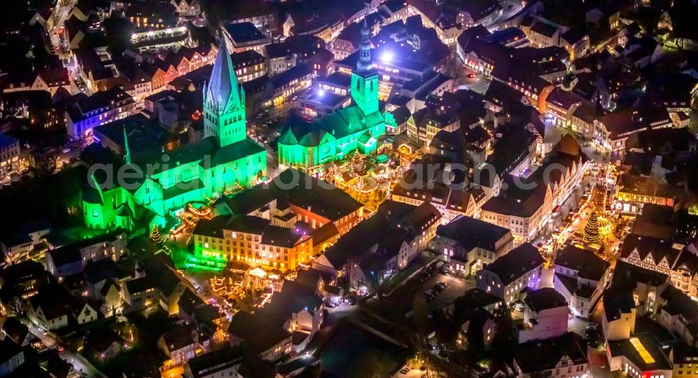 Soest at night from above - Night lighting church building in St. Patrokli- Dom and St. Petri (Alde Kerke) Old Town- center of downtown in Soest in the state North Rhine-Westphalia, Germany