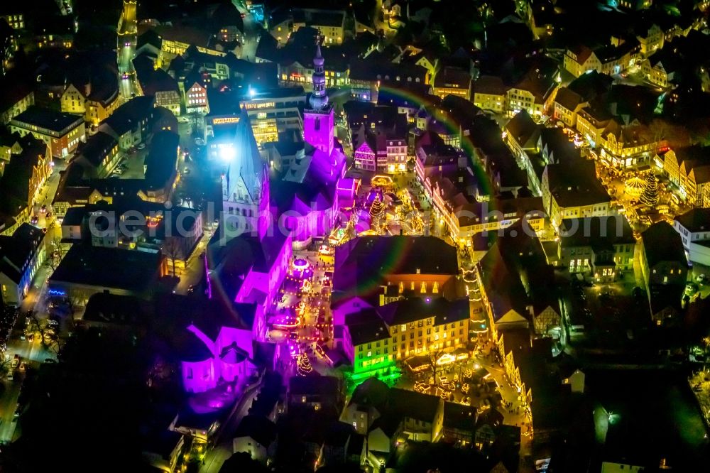 Aerial image at night Soest - Night lighting church building in St. Patrokli- Dom and St. Petri (Alde Kerke) Old Town- center of downtown in Soest in the state North Rhine-Westphalia, Germany