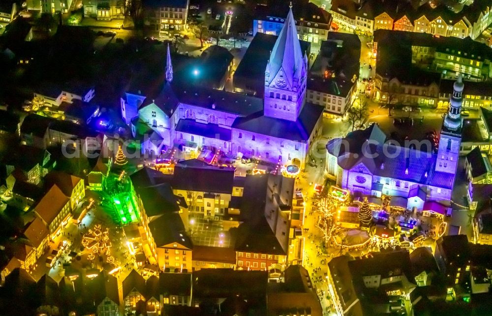 Soest at night from above - Night lighting church building in St. Patrokli- Dom and St. Petri (Alde Kerke) Old Town- center of downtown in Soest in the state North Rhine-Westphalia, Germany