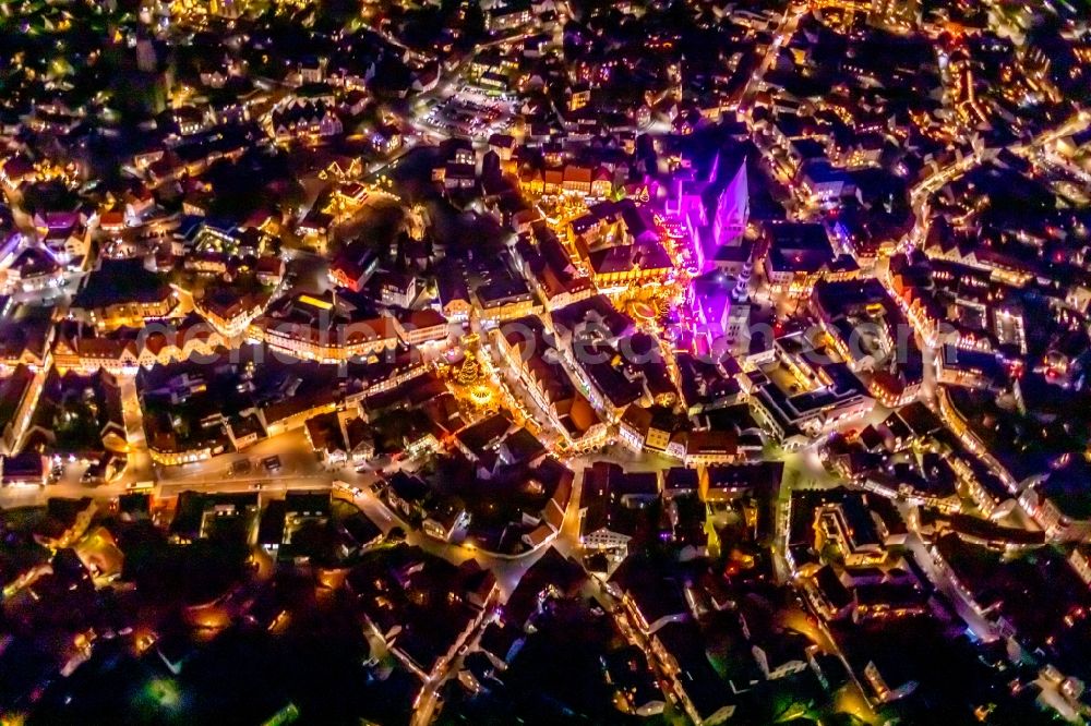 Aerial photograph at night Soest - Night lighting church building in St. Patrokli- Dom and St. Petri (Alde Kerke) Old Town- center of downtown in Soest in the state North Rhine-Westphalia, Germany