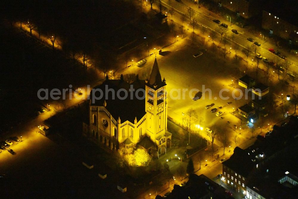 Aerial photograph at night Potsdam - Night lighting Church building in Propsteikirche Sankt Peter and Paul Am Bassinplatz Old Town- center of downtown in the district Innenstadt in Potsdam in the state Brandenburg, Germany