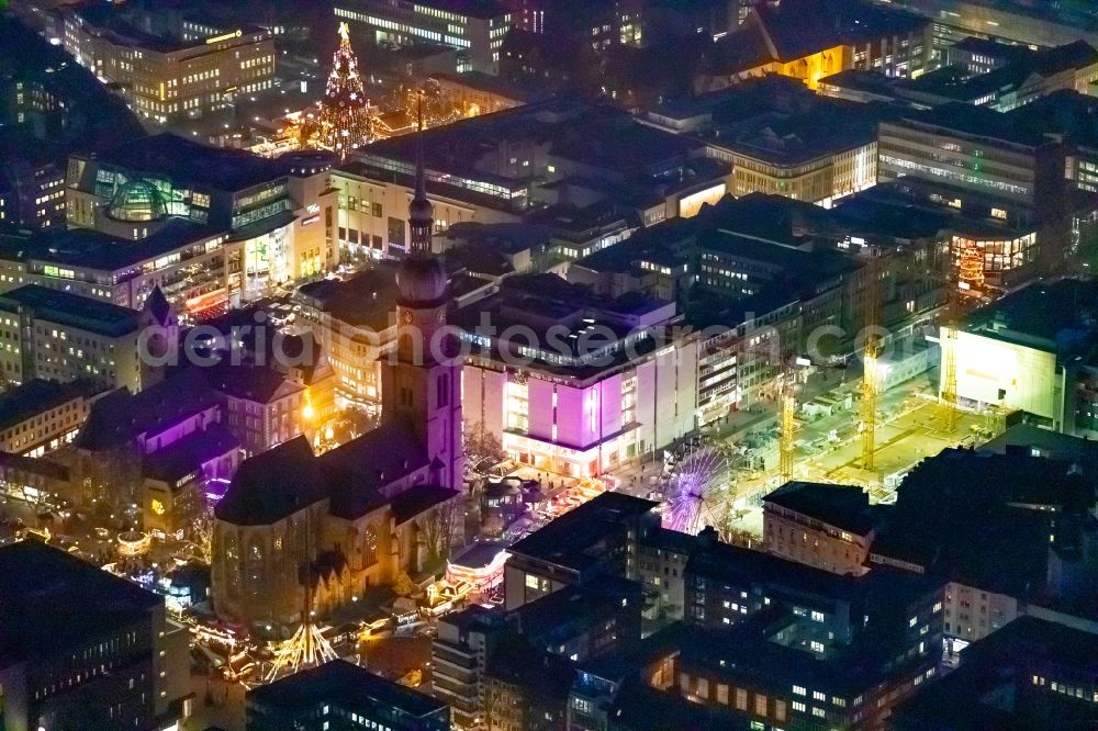 Dortmund at night from the bird perspective: Night lighting church building St. Reinoldi in Dortmund in the state North Rhine-Westphalia, Germany