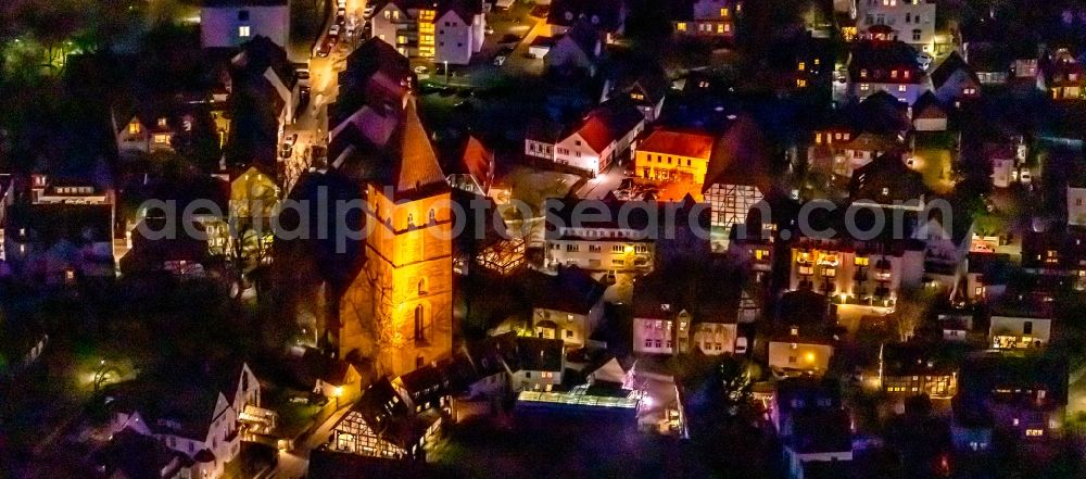 Soest at night from the bird perspective: Night lighting church building in Sankt Pauli Kirche on Paulistrasse Old Town- center of downtown in Soest in the state North Rhine-Westphalia, Germany