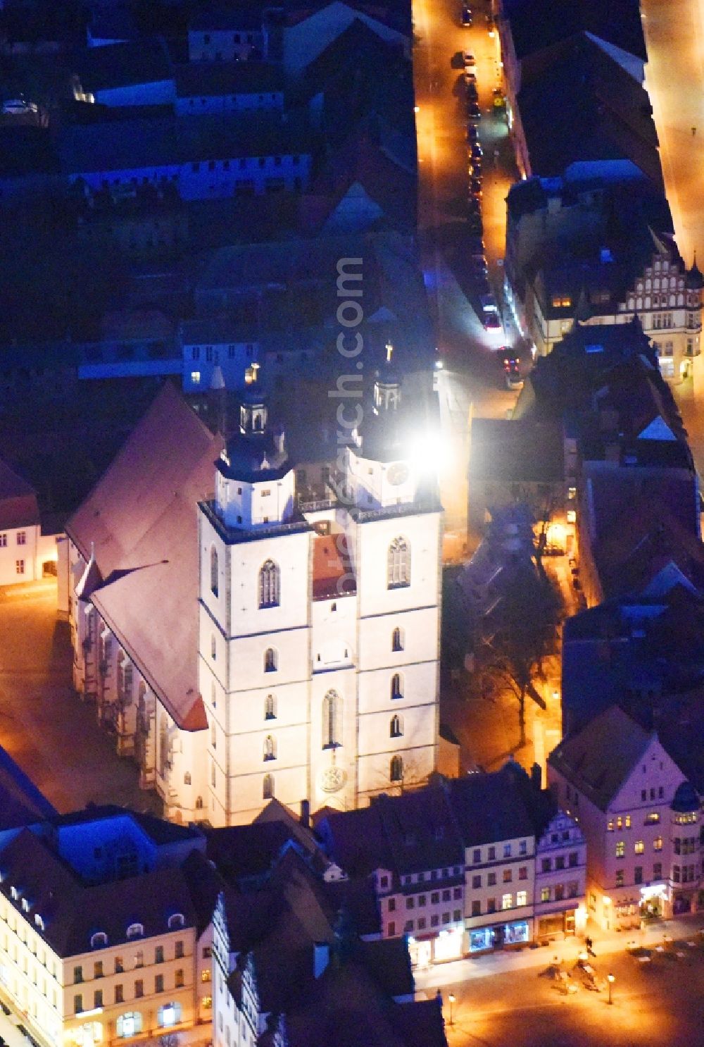 Aerial photograph at night Lutherstadt Wittenberg - Night lighting Church building Stadtkirche Sankt Marien Flaeming/Sachsen-Anhalt on Kirchplatz in Lutherstadt Wittenberg in the state Saxony-Anhalt