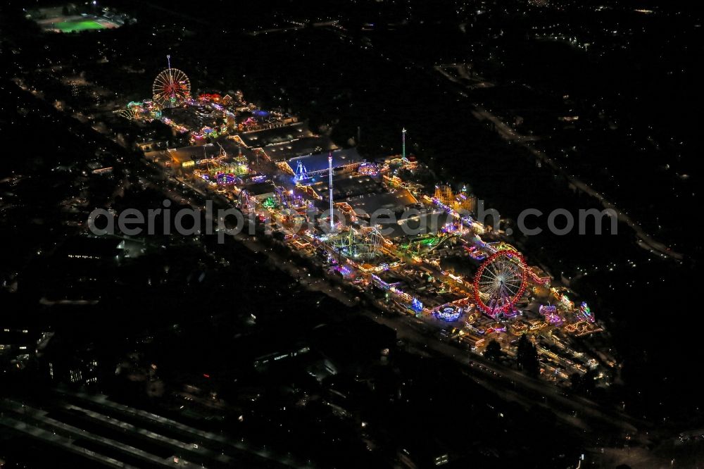 Stuttgart at night from above - Night view of Fair - event location at festival auf den Cannstatter Wasen in Stuttgart in the state Baden-Wuerttemberg