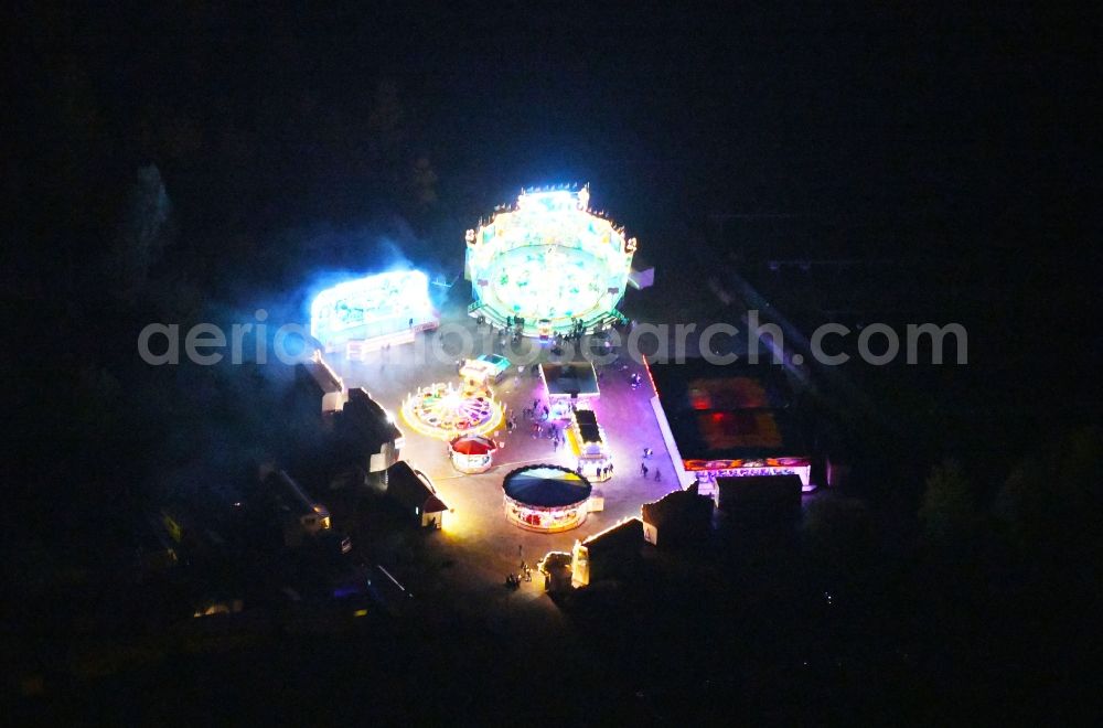 Eberswalde at night from the bird perspective: Night lighting Fair - event location at festival on Eberswalder Strasse in the district Finow in Eberswalde in the state Brandenburg, Germany