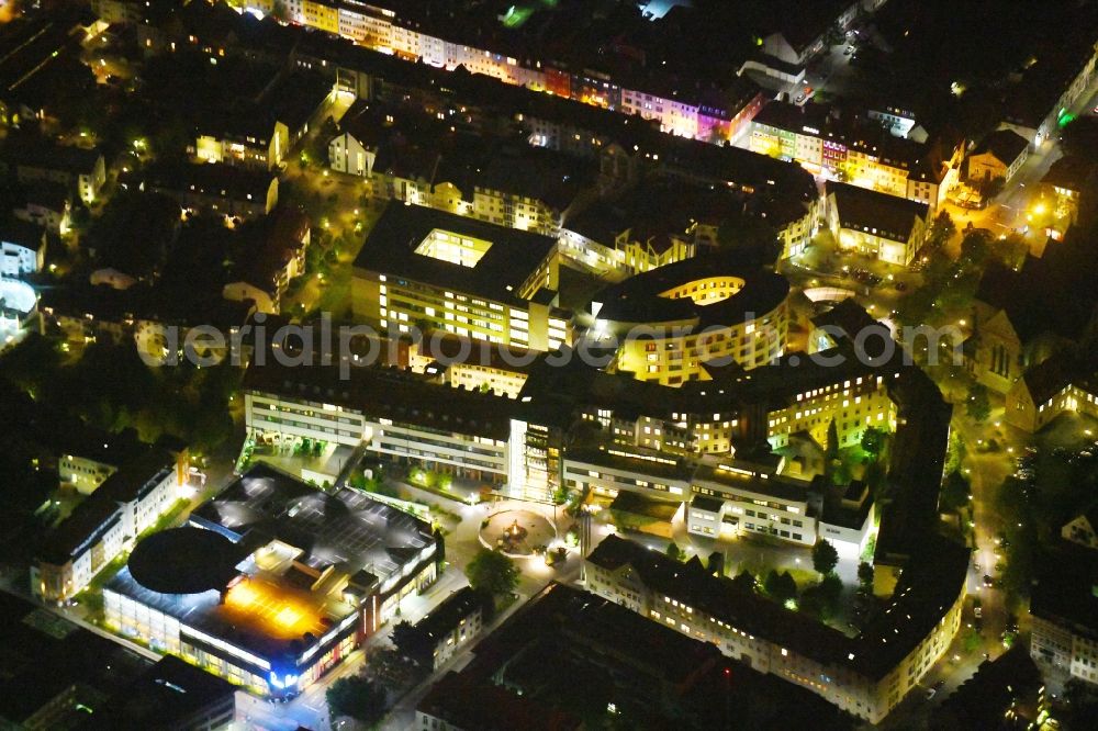 Aerial image at night Osnabrück - Night lighting Hospital grounds of the Clinic Marienhospital in Osnabrueck in the state Lower Saxony, Germany