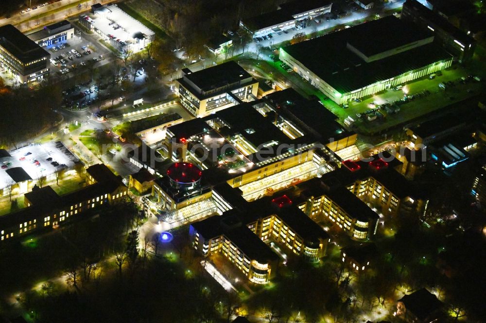 Berlin at night from above - Night lighting Hospital grounds of the Clinic Unfallkrankenhaus Berlin on Warener Strasse in the district Marzahn in Berlin, Germany