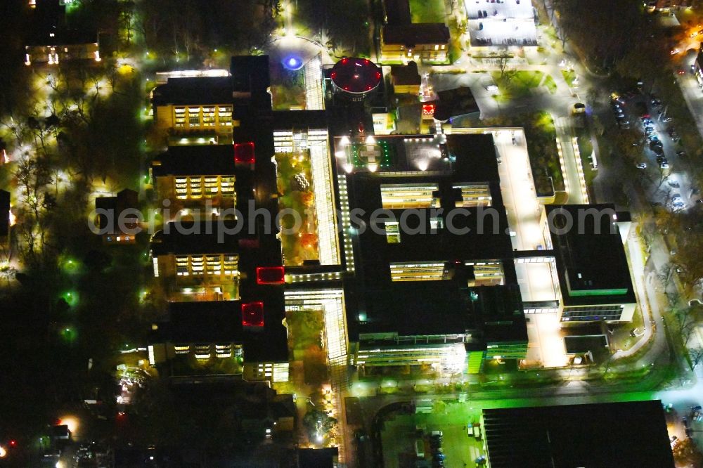 Berlin at night from above - Night lighting Hospital grounds of the Clinic Unfallkrankenhaus Berlin on Warener Strasse in the district Marzahn in Berlin, Germany