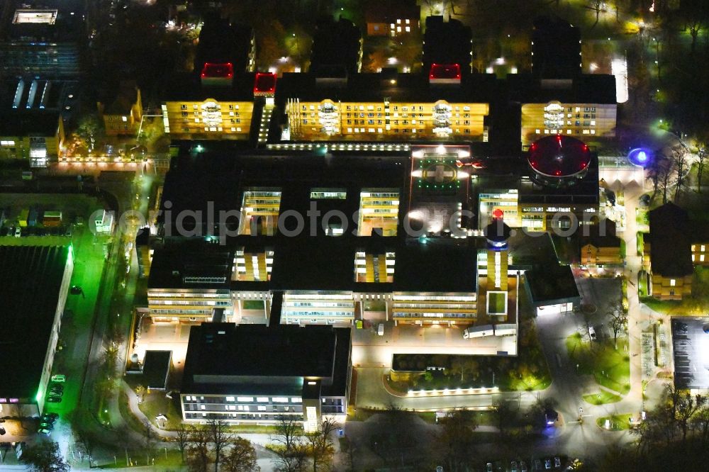 Berlin at night from above - Night lighting Hospital grounds of the Clinic Unfallkrankenhaus Berlin on Warener Strasse in the district Marzahn in Berlin, Germany