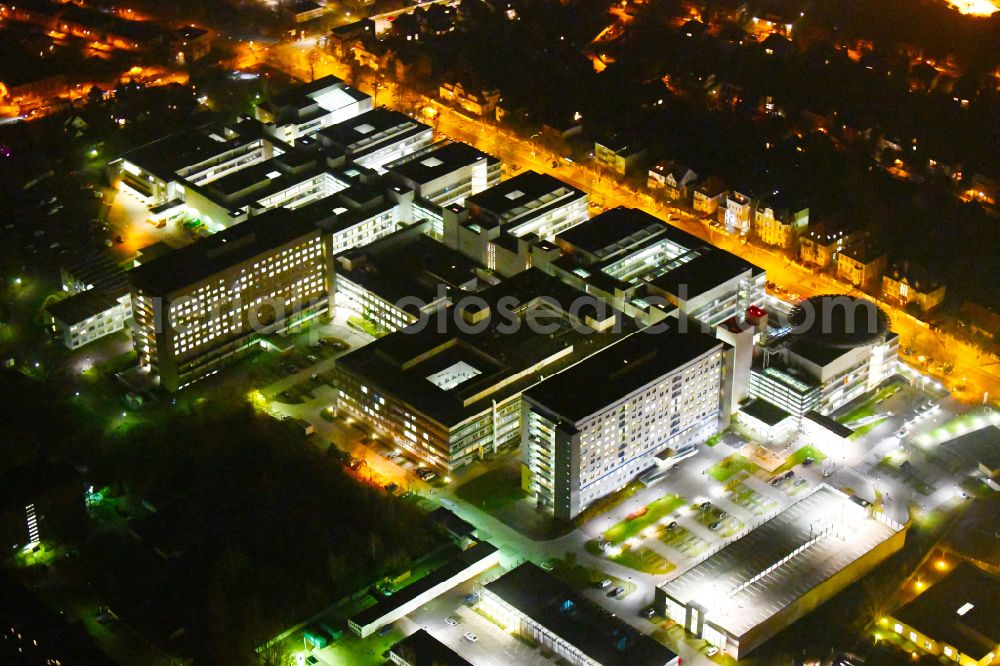 Aerial image at night Halle (Saale) - Night lighting hospital grounds and university clinic in Halle (Saale) in the state Saxony-Anhalt, Germany