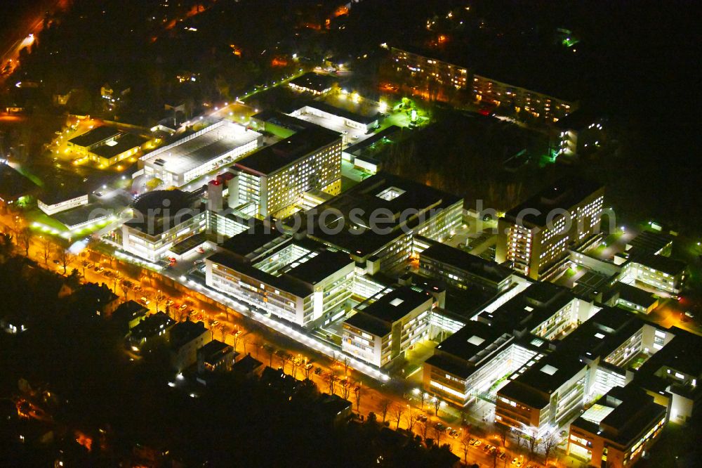 Aerial photograph at night Halle (Saale) - Night lighting hospital grounds and university clinic in Halle (Saale) in the state Saxony-Anhalt, Germany