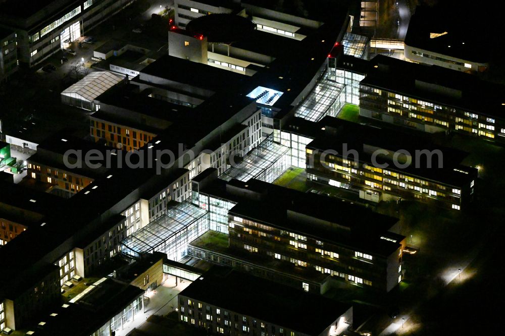 Aerial image at night Jena - Night lighting hospital grounds of the Clinic Universitaetsklinikum on street Erlanger Allee in the district Goeschwitz in Jena in the state Thuringia, Germany