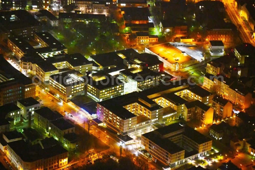 Aerial image at night Leipzig - Night lighting Hospital grounds of the Clinic Universitaetsklinikum Leipzig on Liebigstrasse in the district Mitte in Leipzig in the state Saxony, Germany