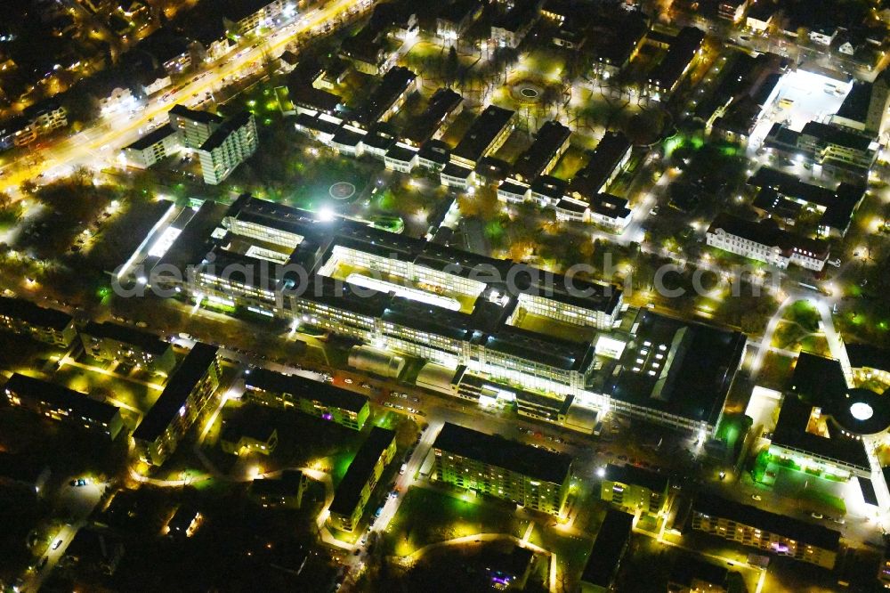 Berlin at night from above - Night lighting Hospital grounds of the Clinic Vivantes Klinikum Neukoelln on Rudower Strasse in the district Neukoelln in Berlin, Germany