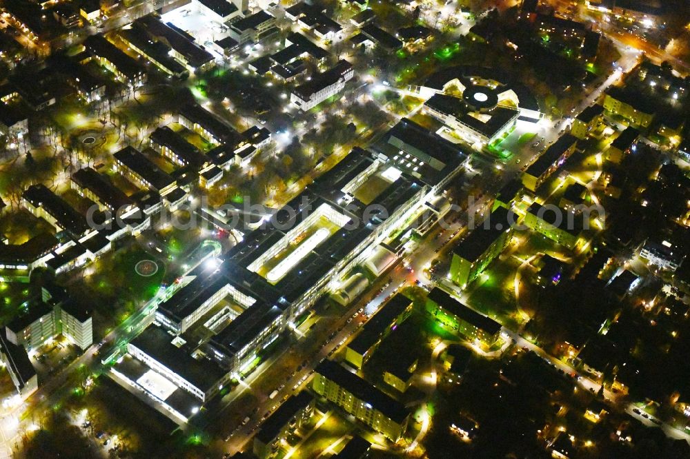 Berlin at night from above - Night lighting Hospital grounds of the Clinic Vivantes Klinikum Neukoelln on Rudower Strasse in the district Neukoelln in Berlin, Germany