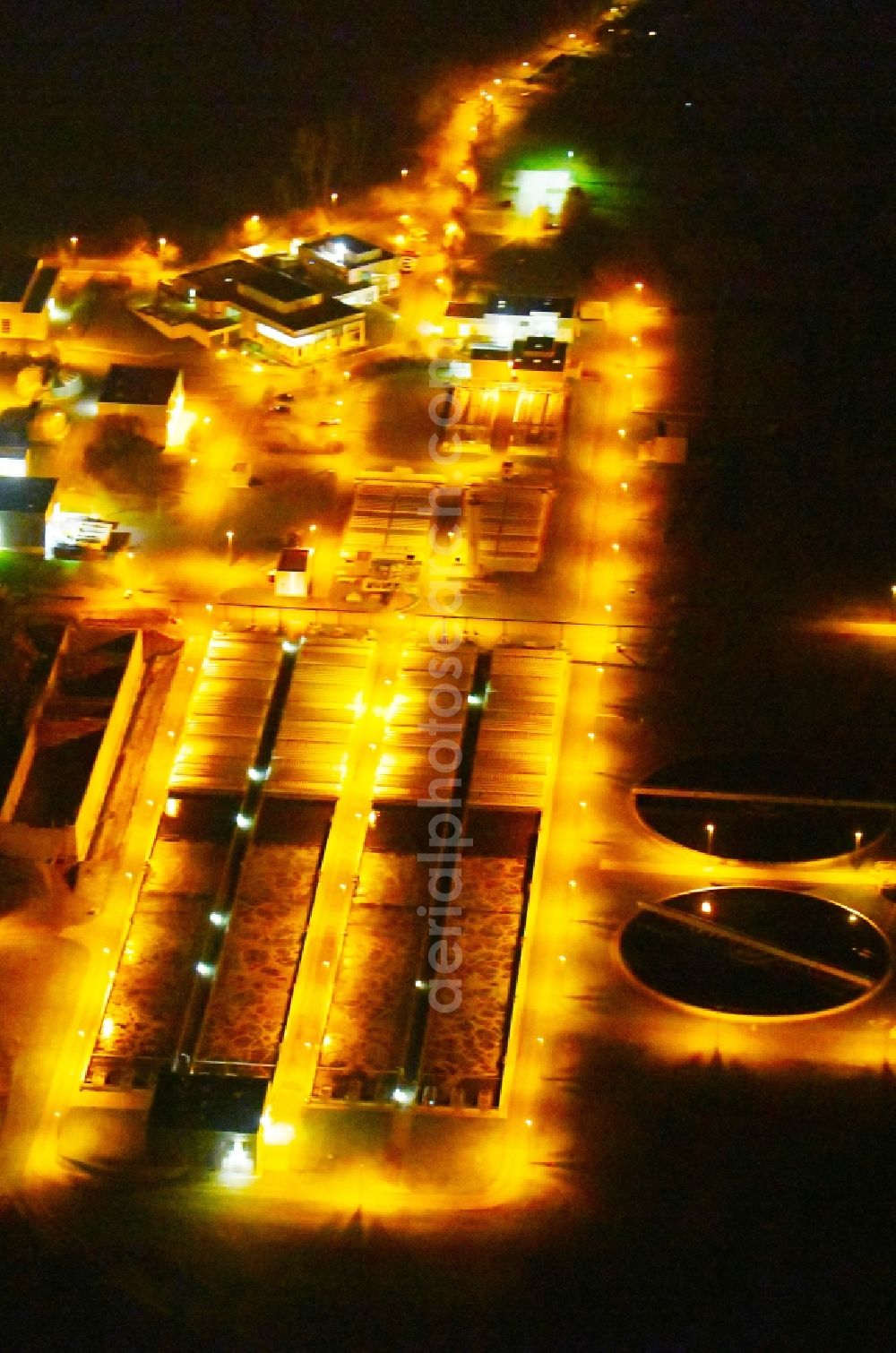 Halle (Saale) at night from above - Night lighting Sewage works Basin and purification steps for waste water treatment Klaeranlage Halle-Nord in Halle (Saale) in the state Saxony-Anhalt, Germany