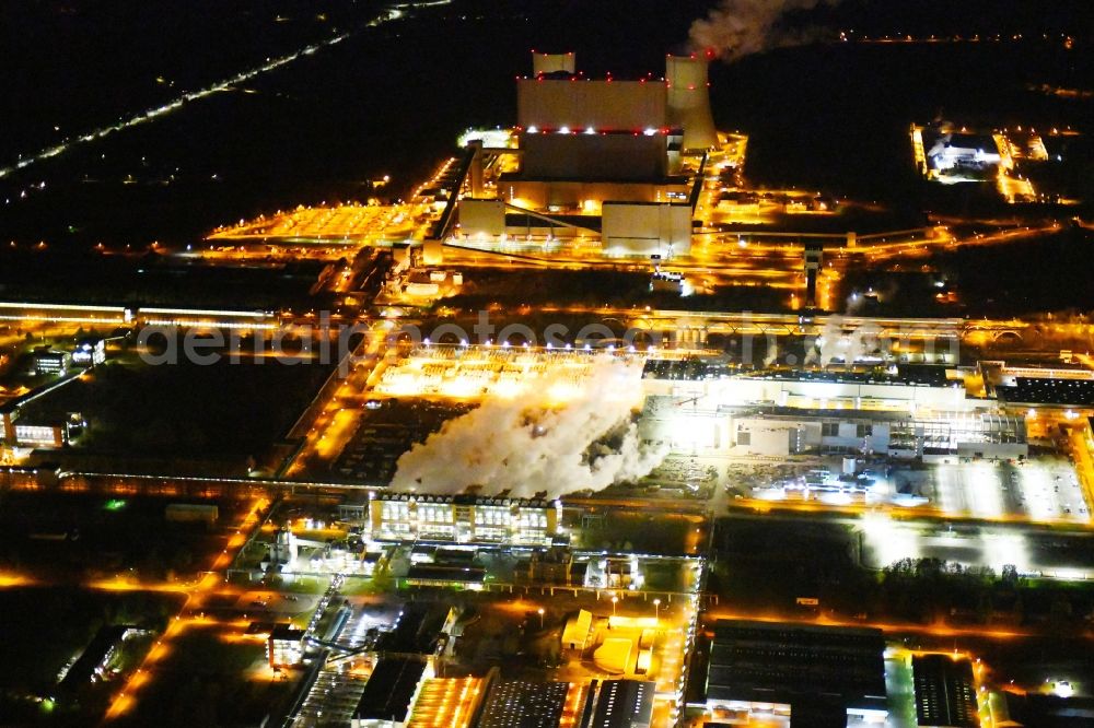 Spremberg at night from the bird perspective: Night lighting coal power plants of the district Schwarze Pumpe in Spremberg in the state Brandenburg, Germany