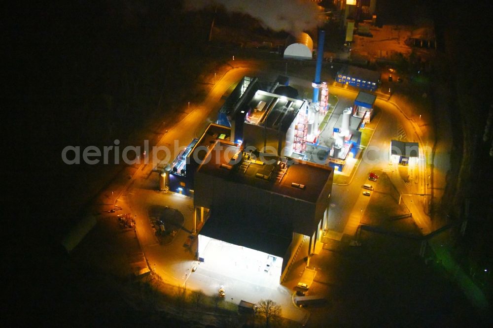 Rüdersdorf at night from above - Night lighting Power plants and exhaust towers of Waste incineration plant station IKW Ruedersdorf on Siedlerweg in Ruedersdorf in the state Brandenburg, Germany