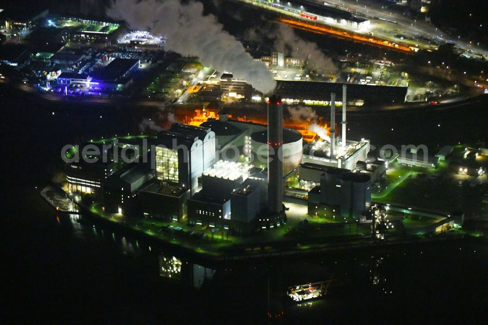 Aerial image at night Hamburg - Night lighting power plants and exhaust towers of thermal power station Vattenfall Kraftwerk Tiefstack in Hamburg, Germany