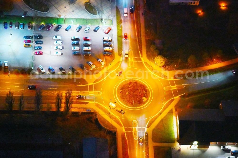 Strausberg at night from above - Night lighting Traffic management of the roundabout road Proetzeler Chaussee in Strausberg in the state Brandenburg, Germany