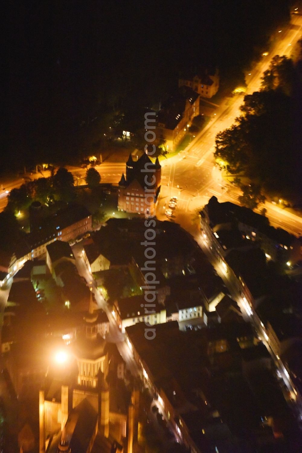 Aerial image at night Stralsund - Night lighting Traffic management of the roundabout road Tribseer Damm - Frankenwall - Knieperwall in Stralsund in the state Mecklenburg - Western Pomerania, Germany