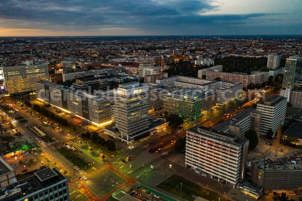 Aerial image at night Berlin - Night lighting road over the crossroads Alexanderplatz - Otto-Braun-Strasse - Karl-Marx-Allee in the district Mitte in Berlin, Germany